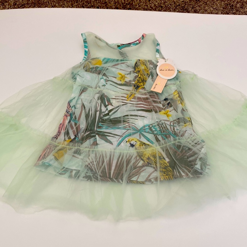 Gorgeous dress with tulle overlay
